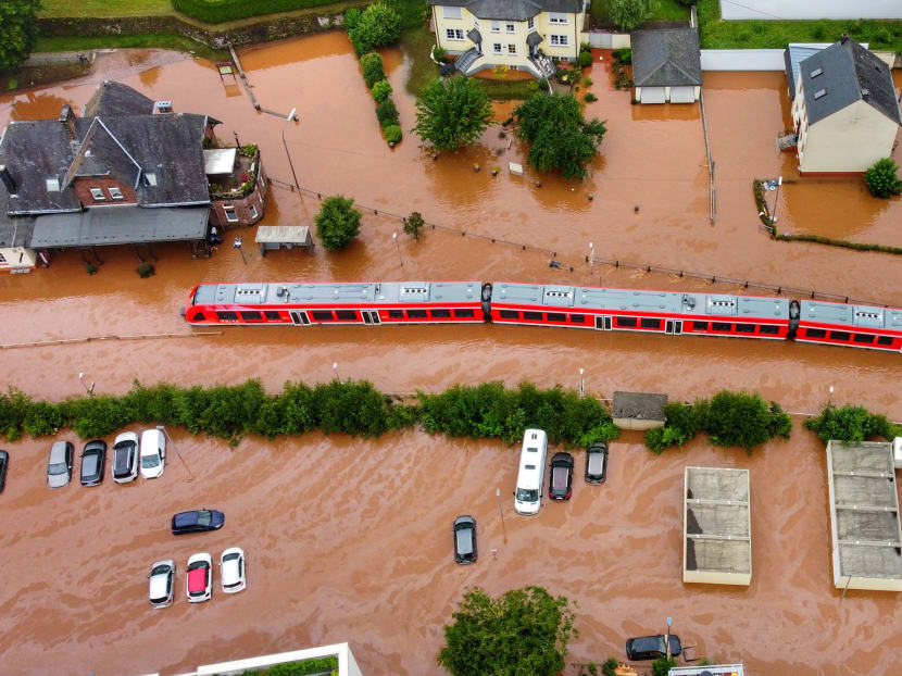 An aerial photo taken on July 15, 2021 shows a train station of the town of Kordel, flooded by the water of the river Kyll, western Germany, following heavy rains.
