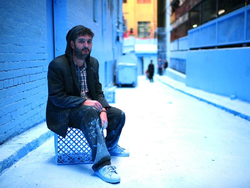 Adrian Doyle isn’t feeling blue about his city’s street art.