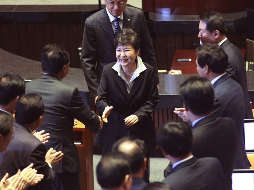 South Korean President Park Geun-hye (centre) has proposed revising the country's Constitution to change the current single five-year presidential system. Photo: AP