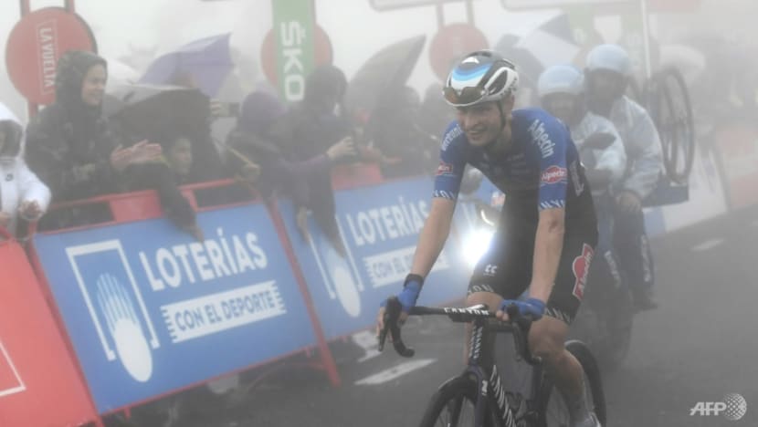 Rookie Evenepoel soars through fog into Vuelta lead Rookie Evenepoel soars through fog into Vuelta lead