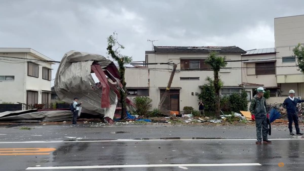 Weakening typhoon churns through Japan, up to six dead