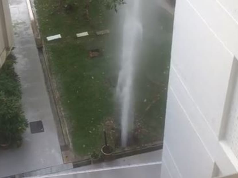 A water pipe burst at a car park in Bukit Batok East Ave 3 early Sunday (Oct 1) sending shooting up into the air. Screengrab: Adora Tan