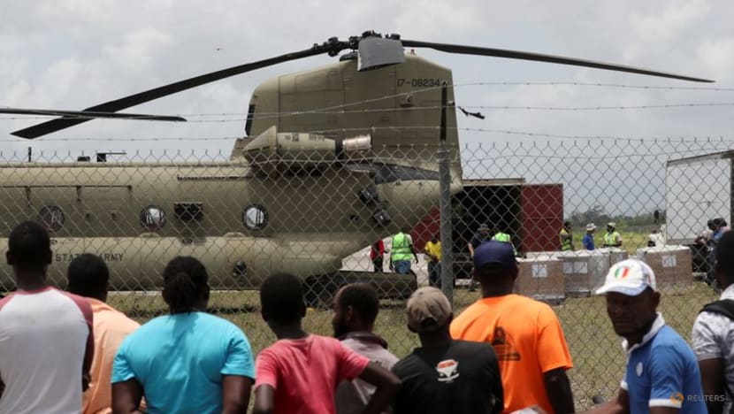 Haitians grow impatient for quake aid as hungry crowd gathers Haitians grow impatient for quake aid as hungry crowd gathers