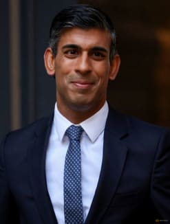 New leader of Britain's Conservative Party Rishi Sunak stands outside the party's headquarters in London, Britain, October 24, 2022. REUTERS/Henry Nicholls 