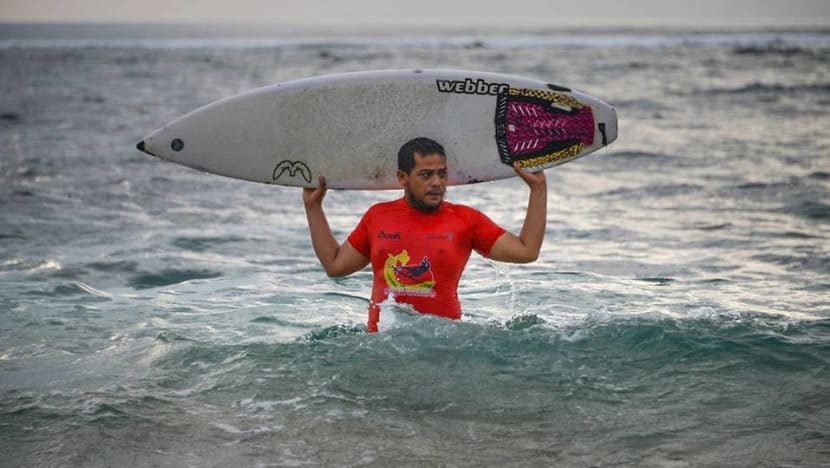 Survival surfing: Indonesians riding the waves to beat tsunami trauma