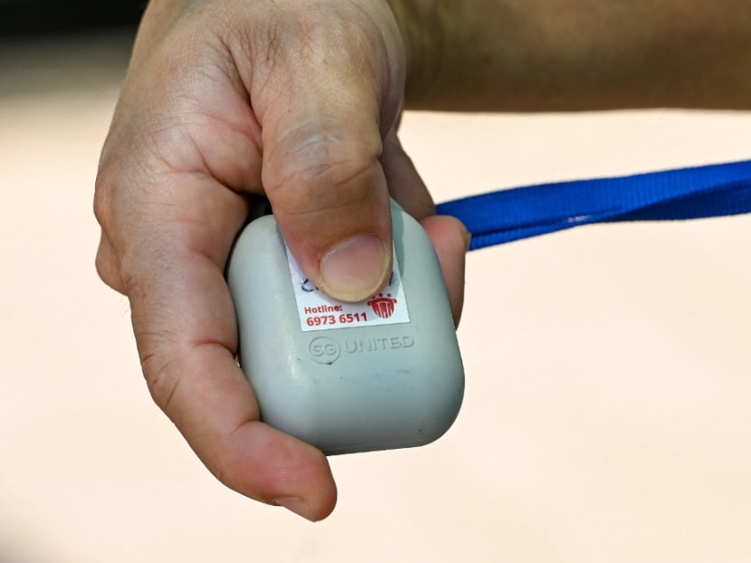 A user displays the TraceTogether token, used for contact tracing system to prevent the spread of Covid-19 coronavirus, in Singapore on Jan 5, 2021.