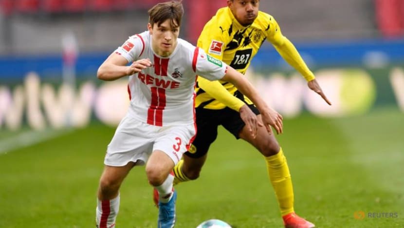 Soccer-Last-gasp Haaland gives Dortmund 2-2 draw at Cologne Soccer-Last-gasp Haaland gives Dortmund 2-2 draw at Cologne