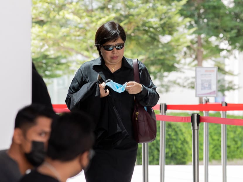 Woman in viral MBS video charged with not wearing face mask outside court, breaching stay-home notice