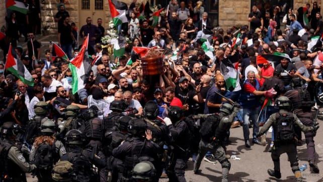 Israel arrests pallbearer beaten at journalist's funeral