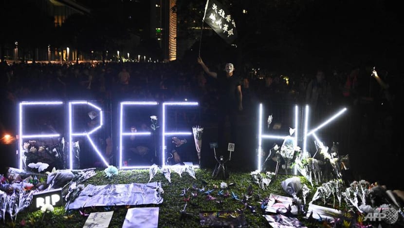 Huge Hong Kong rally after student dies and lawmakers arrested Huge Hong Kong rally after student dies and lawmakers arrested