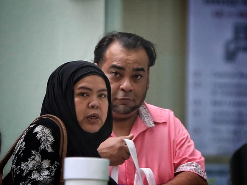 Muhammad Taufiq Md Said (right) told the court that he would not have fought with a man at a petrol station if the man had allowed him to pass when they walked by each other.