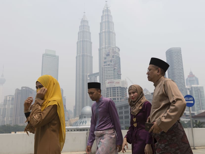Haze enveloped downtown Kuala Lumpur in recent weeks. Photo: AP