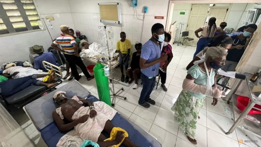 Storm brings floods as Haitians seek help at overloaded hospitals after quake Storm brings floods as Haitians seek help at overloaded hospitals after quake