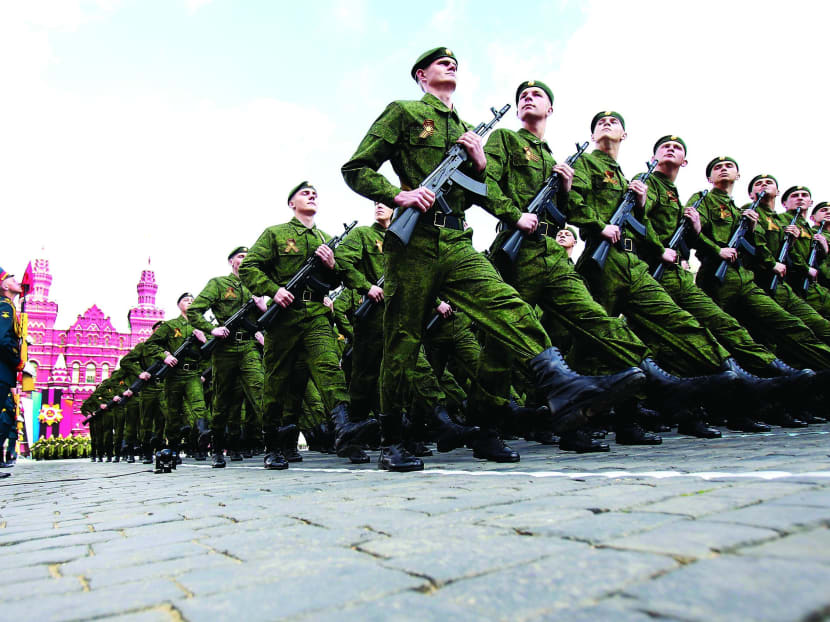 Russian military personnel march along Red Square during a military parade on the Victory Day in Moscow May 9, 2011. Reuters file photo