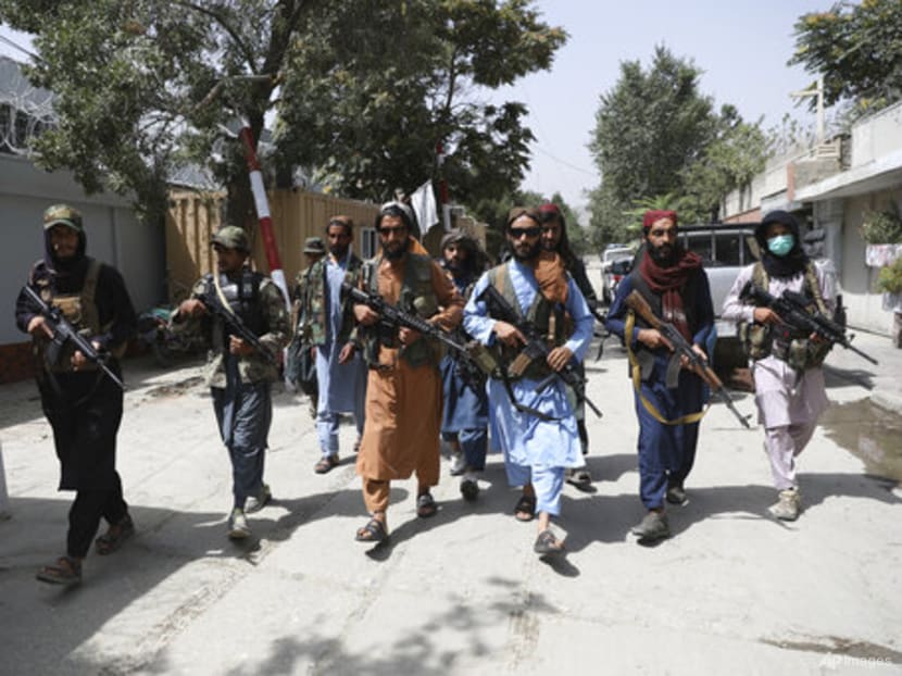 Three killed as Afghan protests test Taliban's promise of peaceful rule Three killed as Afghan protests test Taliban's promise of peaceful rule