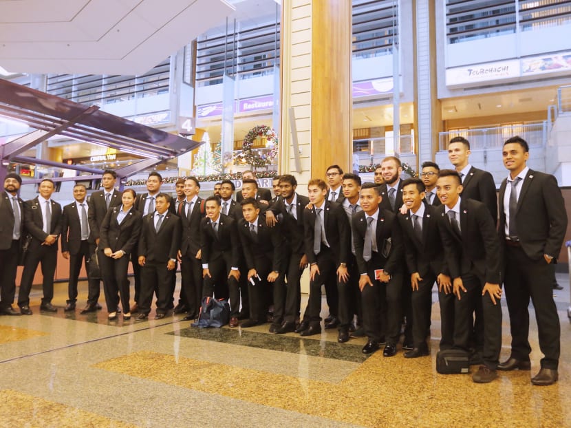 The Lions looking spiffy at Changi Airport Terminal 2 before leaving for Manila yesterday. They will kick off their campaign against the Philippines on Saturday. Photo: Ernest Chua