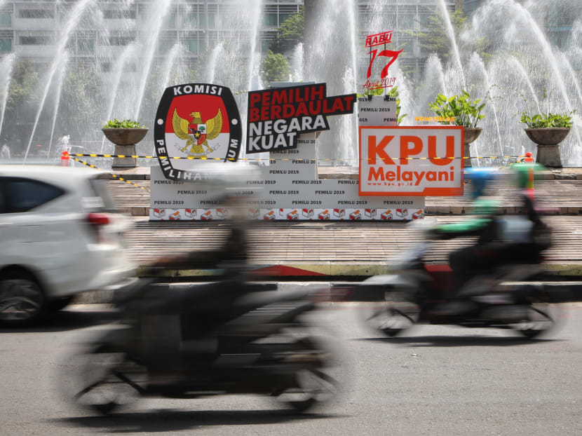 A sign by the Indonesia’s election commission that says “Empowered voters, empower nation” in Bahasa Indonesia at the Selamat Datang Monument in Central Jakarta.