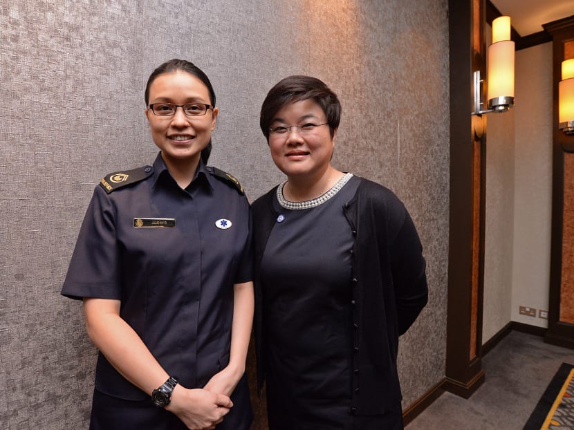 WO Julie Kang Seng Muay (left), SCDF Medical Certification tester; and Ms Rachel Ng Yew Heang, MHA director of Community Partnership Division were among those who were promoted. Photo: Robin Choo