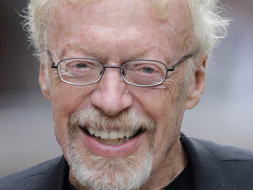 File-This July 11, 2013, file photo shows Phil Knight, the co-founder and chairman of Nike, Inc., walking during a break at the Allen & Company Sun Valley Conference in Sun Valley, Idaho. Photo: AP