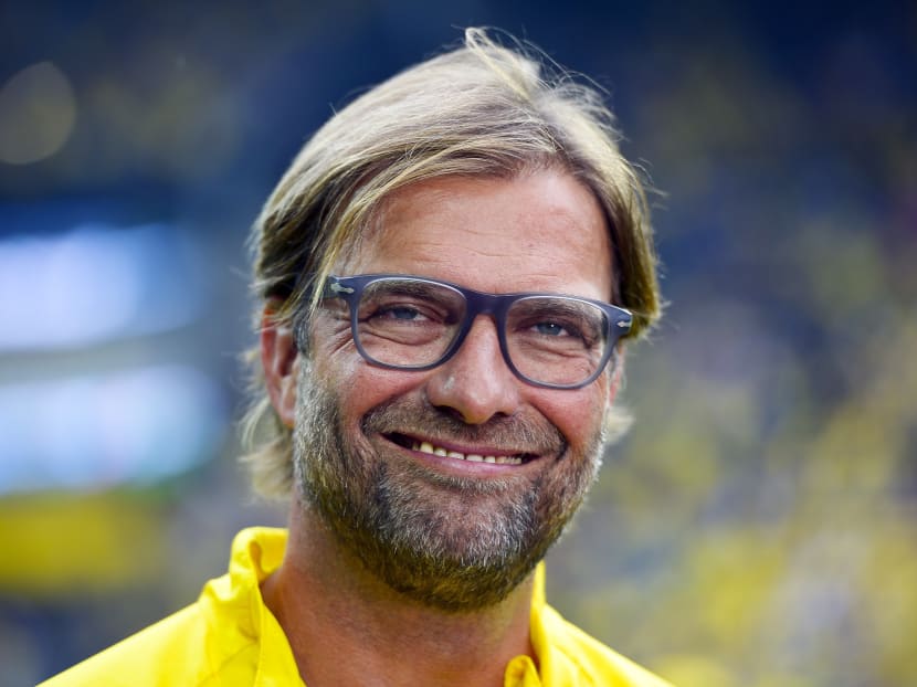 In this Aug 13, 2014 photo Dortmund's head coach Juergen Klopp smiles during the German soccer Super Cup match between Borussia Dortmund and Bayern Munich in Dortmund. Photo: AP