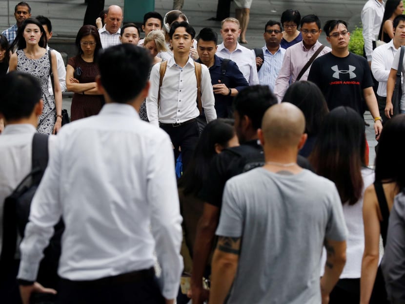 More and more voices are making the case for Singapore to relook its position on the foreign manpower issue, in the face of a severe demographics slowdown. Photo: Reuters