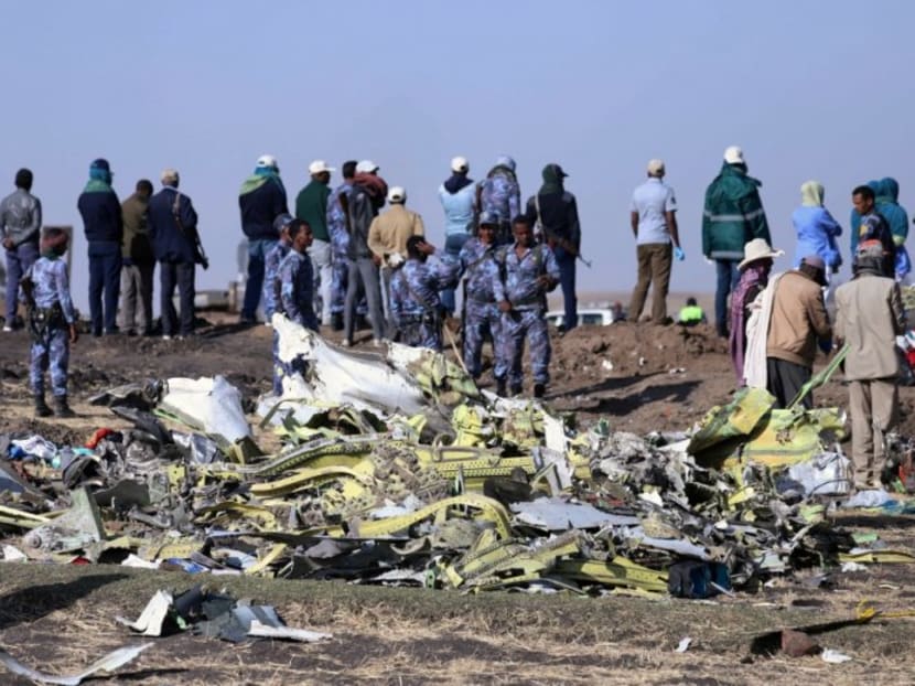 Photo of the day: Ethiopian Federal policemen stand at the scene of the Ethiopian Airlines Flight ET 302 plane crash, near the town of Bishoftu, south-east of Addis Ababa, on March 11, 2019. Photo: Reuters