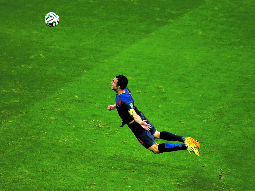 Robin van Persie’s unique header against Spain is one of the outstanding goals at this year’s World Cup in Brazil. Photo: Getty Images