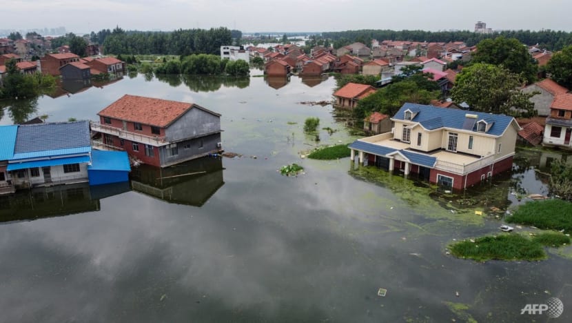 China hit by rare union of record rainfall, heatwaves and a tornado China hit by rare union of record rainfall, heatwaves and a tornado