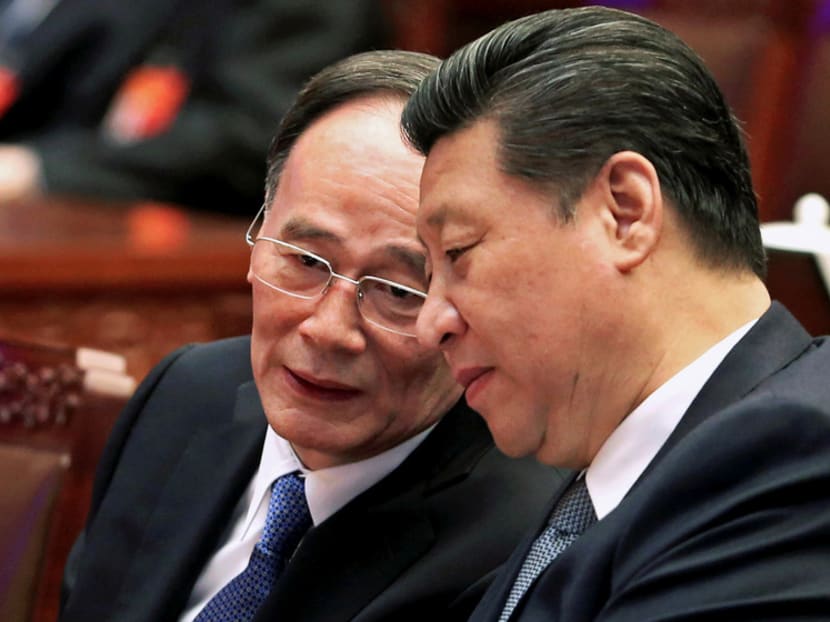 Mr Wang Qishan (left), a princeling with a loyal following among financial technocrats, has wielded a four-year anti-corruption drive to purge rival factions on President Xi’s behalf. Photo: Reuters
