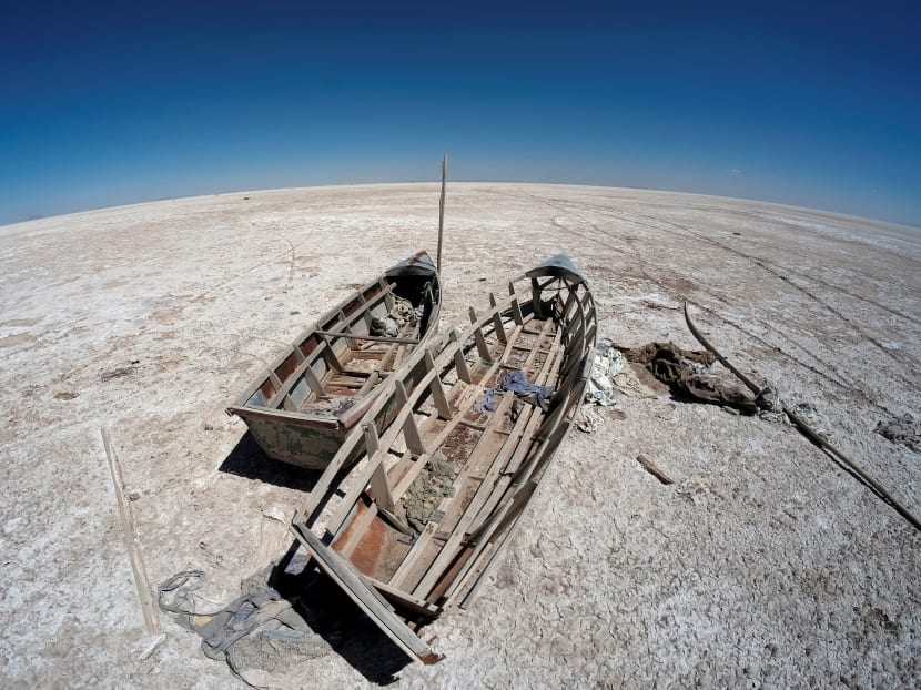 Boats are seen on the dried lake Poopo affected by climate change, in the Oruro Department, Bolivia on September 1, 2017. Boats are seen on the dried lake Poopo affected by climate change, in the Oruro Department, Bolivia on September 1, 2017.