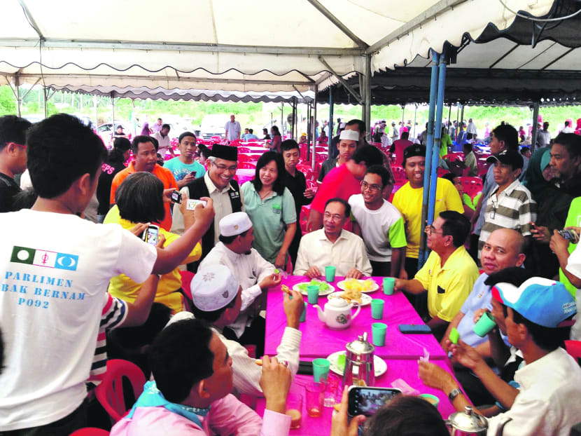 Mr Anwar Ibrahim with his supporters. Photo: Amir Hussain
