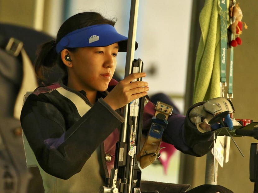 Jasmine Ser competing in the women's 50m Rifle 3 Positions qualification rounds at laat year's Ri Olympics. She is only the third Singaporean to qualify for the Shooting World Cup in october, but says her main focus at this point is firmly on next month's SEA Games. Photo: Reuters