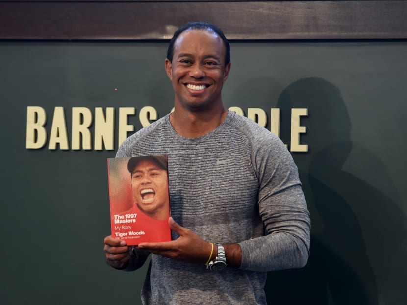 Better days: Tiger Woods at an autograph session for his book, The 1997 Masters: My Story, on May 20, 2017, just over a week before his arrest. Photo: AFP