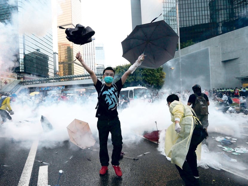 Police fire tear gas at pro-democracy protesters in HK