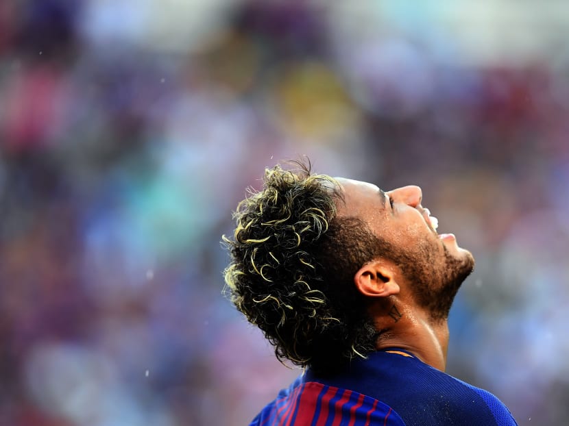 Brazil and Barcelona football star Neymar has completed his world record S$358m move to Paris St Germain. Photo: AFP