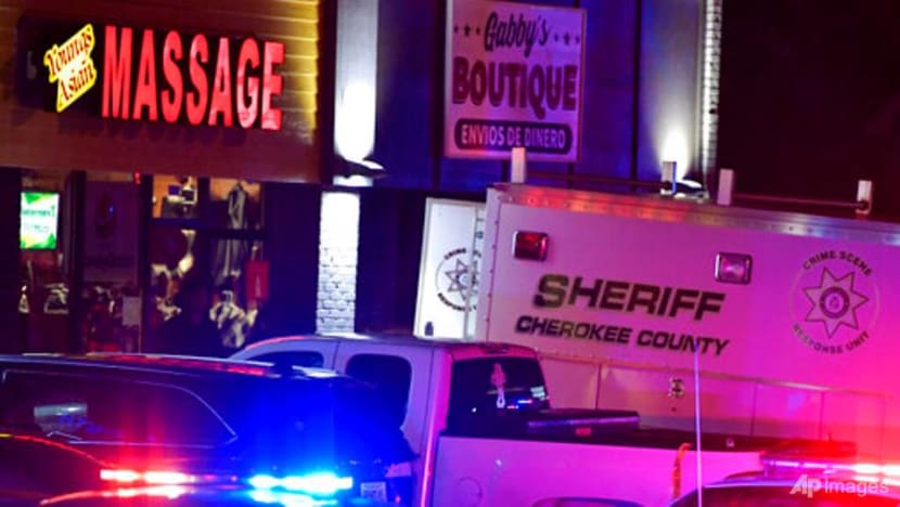 Man in police custody after US massage parlour shootings leave 8 dead