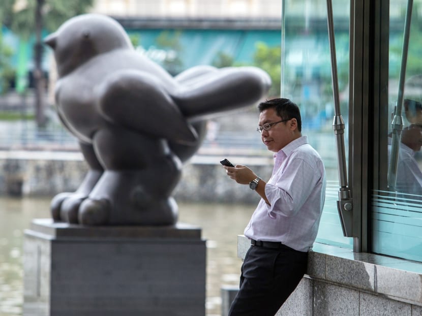 A man uses his mobile phone in the CBD. Photo: Bloomberg