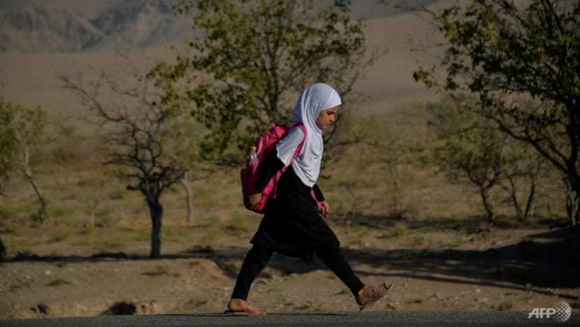 Some girls return to school as Taliban seeks to manage image  