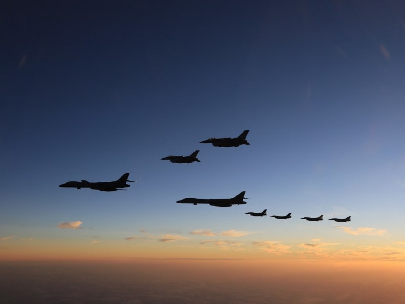 This handout photo taken on Nov 5, 2022 and released by Japan's Ministry of Defense shows members of the Japan Air Self-Defense Force and the US participating in a bilateral military exercise in the skies over Kyushu island. This handout photo taken on Nov 5, 2022 and released by Japan's Ministry of Defense shows members of the Japan Air Self-Defense Force and the US participating in a bilateral military exercise in the skies over Kyushu island.