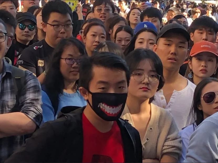 A group of pro-China students at the University of Queensland last week, before a scuffle with protesters who supported Hong Kong activists.