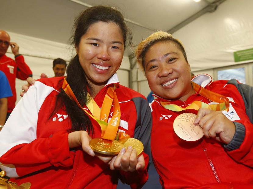 Singapore's double Paralympic gold medalist Yip Pin Xiu (left) and bronze medalist Theresa Goh celebrating their swimming haul from Rio De Janeiro. Photo: Sport Singapore