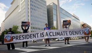 Facing calls to resign, World Bank's Malpass changes answer on climate crisis