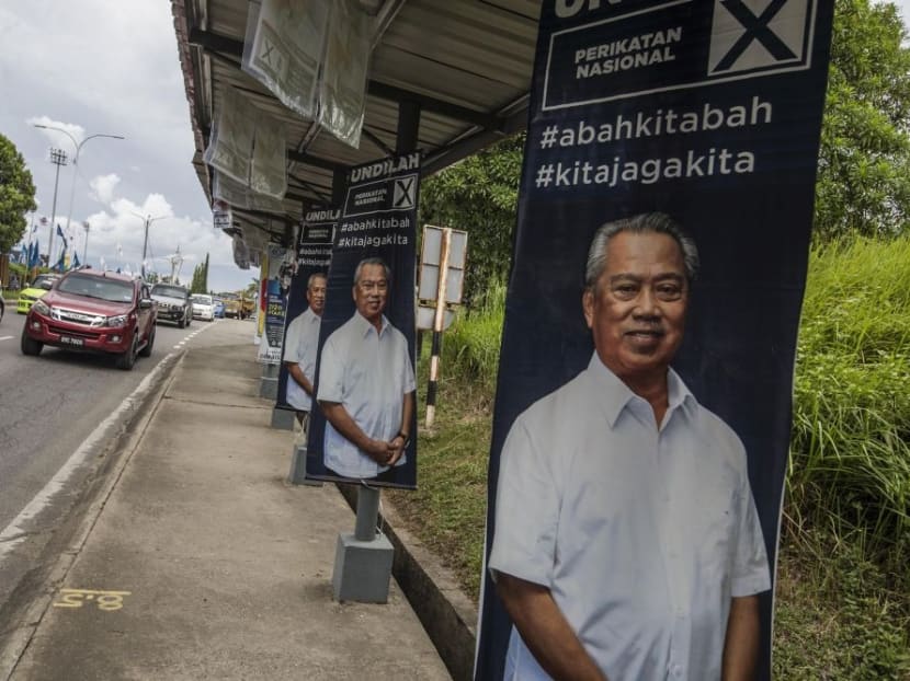 Election posters featuring Perikatan Nasional chairman Muhyiddin in Keningau, Sabah. Election posters featuring Perikatan Nasional chairman Muhyiddin in Keningau, Sabah.
