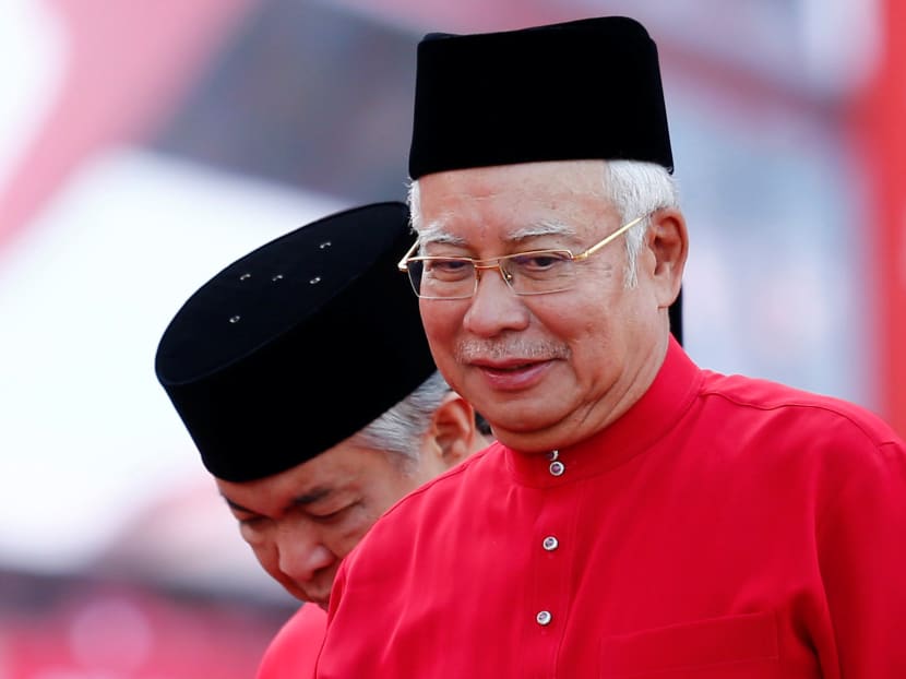 Prime Minister Najib Razak walks beside his deputy Ahmad Zahid Hamidi during the Umno general assembly last week. If the Umno-led ruling coalition wins big in the next election, it could well mean the breakup of the Pakatan Harapan opposition, given its current state of fragile cohesion; while Mr Najib will be confirmed as the most wily sitting prime minister since Dr Mahathir, says the author. Photo: Reuters