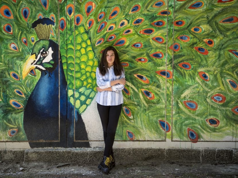 High school student Eva Stojchevska poses for a photograph in Skopje. With their art, technology know how, creative social media skills or political commitment, post-millennials known as Generation Z have found their own ways of helping others through the coronavirus lockdown.