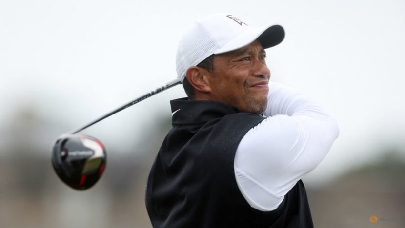 Young leads Open as Woods bids to salvage pride Young leads Open as Woods bids to salvage pride