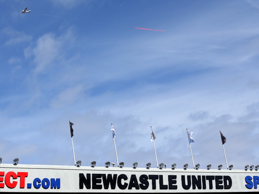 A aeroplane is seen in the sky above the English Premier League football match between Newcastle United and Tottenham Hotspur at St James' Park in Newcastle-upon-Tyne, north east England in this May 15, 2016 file photo. Photo: AFP