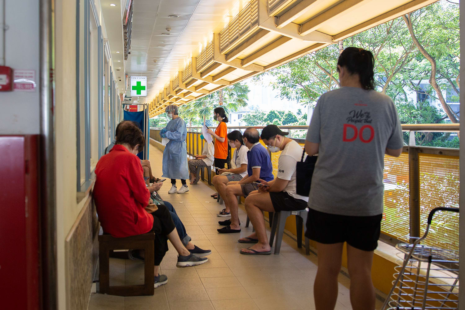 Patients are seen outside a clinic at Tiong Bahru on Feb 25, 2022. Patients are seen outside a clinic at Tiong Bahru on Feb 25, 2022.