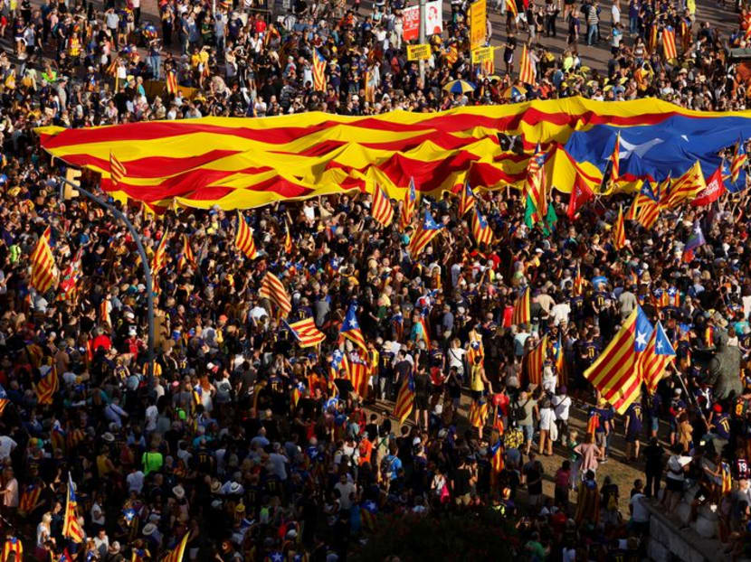 Thousands mark Catalonia Day as regional parties become Spain's kingmakers