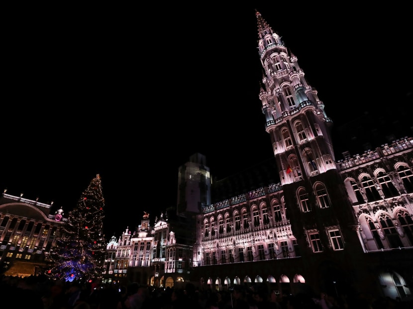 Brussels' Grand Place is illuminated during a light show as part of Christmas festivities on Nov 29, 2019.